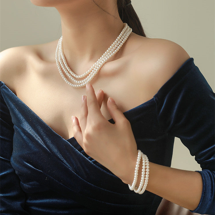 Elegance Triple-Layer Freshwater Pearl Necklace – 925 Silver Clasp